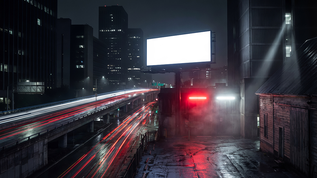 mpty billboard mockup on a neon-noir highway overpass with red and white night traffic light trails